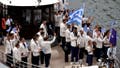PARIS, FRANCE - JULY 26: Giannis Antetokounmpo, Flagbearer of Team Greece, waves their flag on the team boat during the opening ceremony of the Olympic Games Paris 2024 on July 26, 2024 in Paris, France. (Photo by Lars Baron/Getty Images) - Fox News