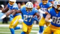 INGLEWOOD, CALIFORNIA - SEPTEMBER 08: J.K. Dobbins #27 of the Los Angeles Chargers runs the ball during the third quarter against the Las Vegas Raiders at SoFi Stadium on September 08, 2024 in Inglewood, California. (Photo by Ronald Martinez/Getty Images) - Fox News