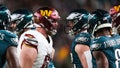 PHILADELPHIA, PENNSYLVANIA - NOVEMBER 14: Tyler Biadasz #63 of the Washington Commanders and Reed Blankenship #32 of the Philadelphia Eagles exchange words during the first quarter at Lincoln Financial Field on November 14, 2024 in Philadelphia, Pennsylvania. (Photo by Elsa/Getty Images) - Fox News