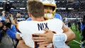INGLEWOOD, CALIFORNIA - DECEMBER 19: Justin Herbert #10 of the Los Angeles Chargers hugs Bo Nix #10 of the Denver Broncos after the game at SoFi Stadium on December 19, 2024 in Inglewood, California. (Photo by Sean M. Haffey/Getty Images) - Fox News