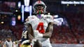 ATLANTA, GEORGIA - JANUARY 20: Jeremiah Smith #4 of the Ohio State Buckeyes celebrates after scoring a touchdown against the Notre Dame Fighting Irish during the second quarter in the 2025 CFP National Championship at the Mercedes-Benz Stadium on January 20, 2025 in Atlanta, Georgia. (Photo by Todd Kirkland/Getty Images) - Fox News