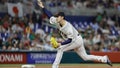 Mar 20, 2023; Miami, Florida, USA; Japan starting pitcher Roki Sasaki (14) delivers a pitch during the first inning against Mexico at LoanDepot Park. Mandatory Credit: Sam Navarro-USA TODAY Sports - Fox News