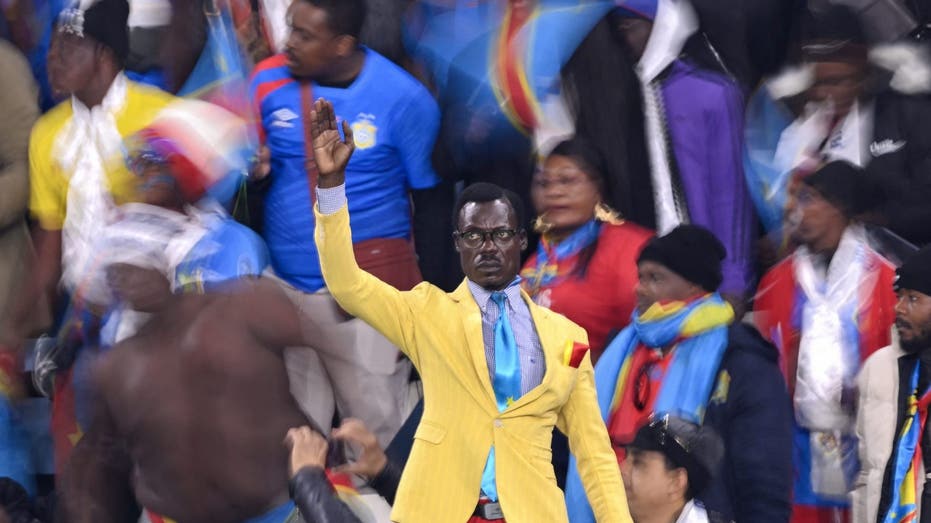 Why Does 'Lumumba Vea,' DR Congo's 'Statue Man,' Stand The Whole Match?